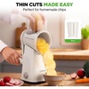 image:imageNutriChef 5 in 1 Cheese Grater amp Shredder  5 Different Blades for Thin Thick Julienne Strips Wavy amp Straight Strips  Includes Hand Crank Strong Suction Base amp Storage Container  WhiteWhite