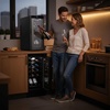 image:imageNutrichef 12 Bottle Stainless Steel Slim Wine Fridge  Red amp White Wine Chiller  Adjustable Temperature Control Ultra Quiet Operation amp Energy Efficient  Mini Wine Cooler Refrigerator 31x10x17 IN