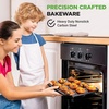 image:imageNutriChef Muffin Pans for Baking 4Pack  Nonstick 12 Mold Cupcake Tins  Carbon Steel Stackable Cup Cake Trays  Dishwasher amp Oven Safe  Includes 200 Parchment Paper Liners  13 x 10 x 1  GoldBlack